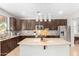 Kitchen island with ample counter space and modern pendant lighting at 3702 W Riordan Ranch Rd, Phoenix, AZ 85083