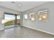 Gathering room with sliding glass doors to the backyard at 19366 W San Juan Ave, Litchfield Park, AZ 85340