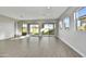 Bright and airy Gathering room with sliding glass doors and backyard access at 19366 W San Juan Ave, Litchfield Park, AZ 85340