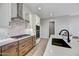 Modern kitchen with stainless steel appliances and a large island at 19366 W San Juan Ave, Litchfield Park, AZ 85340