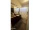 Main bathroom with double sinks and shower/tub combo at 2450 W Glenrosa Ave # 12, Phoenix, AZ 85015