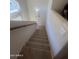 Carpeted staircase leading to upper level at 2450 W Glenrosa Ave # 12, Phoenix, AZ 85015