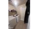 Laundry room with washer, dryer, and shelving at 2450 W Glenrosa Ave # 28, Phoenix, AZ 85015