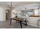 Kitchen features an adjacent dining area with a dark wood table at 282 E Bartlett Way, Chandler, AZ 85249