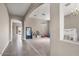 Bright and spacious living room with high ceilings, neutral color palette, and tile flooring at 282 E Bartlett Way, Chandler, AZ 85249