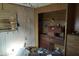 A bedroom with damaged walls and flooring at 65 S Mountain Rd, Apache Junction, AZ 85120