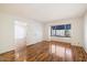 Empty bedroom with wood floors and a window at 7632 E Bonita Dr, Scottsdale, AZ 85250