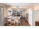 Galley kitchen with grey cabinets, laminate floor, and a breakfast bar at 526 E Viola St, Casa Grande, AZ 85122