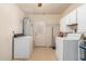 Laundry room with washer, dryer, and exterior access at 526 E Viola St, Casa Grande, AZ 85122