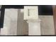 Image showcases various kitchen and bathroom finishes including countertops, cabinets, and flooring at 19366 W San Juan Ave, Litchfield Park, AZ 85340