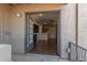 Front entry with view into living area and hardwood floors at 5995 N 78Th St # 1108, Scottsdale, AZ 85250