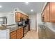 Modern kitchen with stainless steel appliances and granite countertops at 5995 N 78Th St # 1108, Scottsdale, AZ 85250