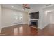 Bright living room with fireplace and hardwood floors at 5995 N 78Th St # 1108, Scottsdale, AZ 85250