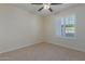 Well-lit bedroom with ceiling fan and neutral decor at 5995 N 78Th St # 1108, Scottsdale, AZ 85250
