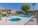 Community pool and spa with surrounding lounge chairs at 5995 N 78Th St # 1108, Scottsdale, AZ 85250