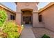 Inviting front entrance with stone accents and landscaping at 10913 N 153Rd Ln, Surprise, AZ 85379