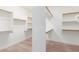 Spacious walk-in closet with ample shelving and hanging space at 10913 N 153Rd Ln, Surprise, AZ 85379