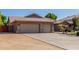 Two-story house with two-car garage and landscaping at 10913 N 153Rd Ln, Surprise, AZ 85379