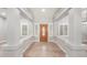 Bright entryway with wood floors and neutral colors at 10913 N 153Rd Ln, Surprise, AZ 85379