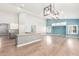 Open kitchen with granite countertops and stainless steel appliances at 10913 N 153Rd Ln, Surprise, AZ 85379