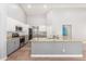 Modern kitchen with granite countertops and stainless steel appliances at 10913 N 153Rd Ln, Surprise, AZ 85379