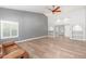 Spacious living room featuring hardwood floors and recessed lighting at 10913 N 153Rd Ln, Surprise, AZ 85379