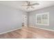 Bedroom with ceiling fan and wood flooring at 10913 N 153Rd Ln, Surprise, AZ 85379