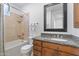 Well-appointed bathroom with granite vanity and bathtub at 10793 E La Junta Rd, Scottsdale, AZ 85255