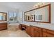 Spa-like bathroom with soaking tub and double vanities at 10793 E La Junta Rd, Scottsdale, AZ 85255