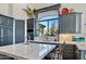 Spacious kitchen with modern cabinetry and large island at 10793 E La Junta Rd, Scottsdale, AZ 85255