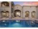 Stunning pool with reflection of home's architecture at 10793 E La Junta Rd, Scottsdale, AZ 85255
