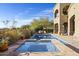 Inviting pool and spa with ample deck space for lounging at 10793 E La Junta Rd, Scottsdale, AZ 85255