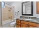 Modern bathroom featuring granite countertop and bathtub at 10793 E La Junta Rd, Scottsdale, AZ 85255