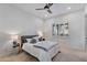 Bright bedroom with plush bedding and window seating at 10793 E La Junta Rd, Scottsdale, AZ 85255