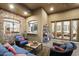 Relaxing patio with seating area, views of the backyard and access to the interior at 10793 E La Junta Rd, Scottsdale, AZ 85255