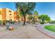 Desert landscaping with walking path and building view at 12212 N Paradise Village S Pkwy # 451, Phoenix, AZ 85032