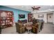 Relaxing community room with comfortable seating, bookshelves, and a large TV at 12212 N Paradise Village S Pkwy # 451, Phoenix, AZ 85032