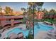 Aerial view of the community pool and surrounding landscaping at 12212 N Paradise Village S Pkwy # 451, Phoenix, AZ 85032