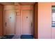 Exterior view of condo building showing two condo entrances at 12212 N Paradise Village S Pkwy # 451, Phoenix, AZ 85032