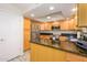 Updated kitchen with stainless steel appliances and granite countertops at 12212 N Paradise Village S Pkwy # 451, Phoenix, AZ 85032