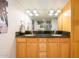 Double vanity bathroom with granite countertops and large shower at 12212 N Paradise Village S Pkwy # 451, Phoenix, AZ 85032