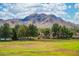 Scenic view of the golf course and mountains at 12212 N Paradise Village S Pkwy # 451, Phoenix, AZ 85032