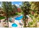 Complex pool area with a hot tub, and lounge chairs at 12212 N Paradise Village S Pkwy # 451, Phoenix, AZ 85032