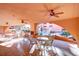 Community patio with tables, chairs, and a view of the pool at 12212 N Paradise Village S Pkwy # 451, Phoenix, AZ 85032