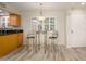 Kitchen with breakfast bar and modern light fixture at 12212 N Paradise Village S Pkwy # 451, Phoenix, AZ 85032