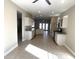 Open kitchen with island, granite counters, and stainless steel appliances at 20117 N Portico Way, Surprise, AZ 85387