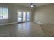 Spacious living room with access to the backyard at 20117 N Portico Way, Surprise, AZ 85387