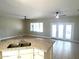 Kitchen with island, double sink, and granite countertops at 20117 N Portico Way, Surprise, AZ 85387