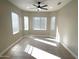 Bright dining area with tile flooring and large windows at 20117 N Portico Way, Surprise, AZ 85387