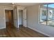 Spacious bedroom with hardwood floors and large window at 2158 N Yale --, Mesa, AZ 85213
